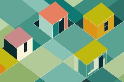 mehrere kleine modellhäuser in dominoform